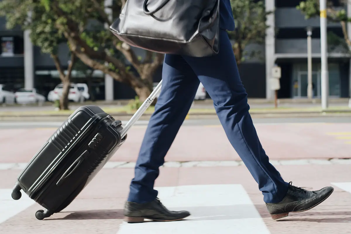walking businessman in city for commute